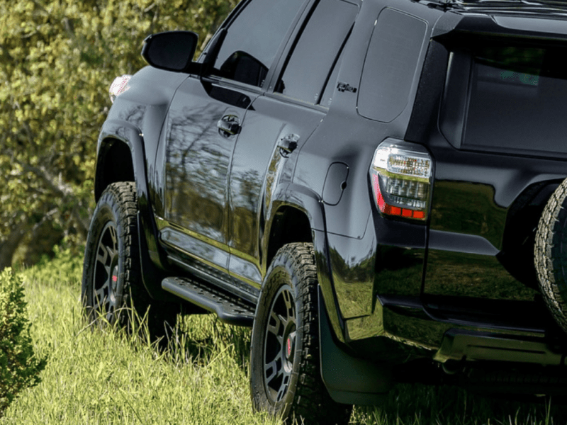 Cali Raised LED 10 - 24 Toyota 4Runner Step Ed Bolt - On Rock Sliders with Kick Out and Bed Liner Filler Plate | calCR2892 - JDMuscleSPK800705