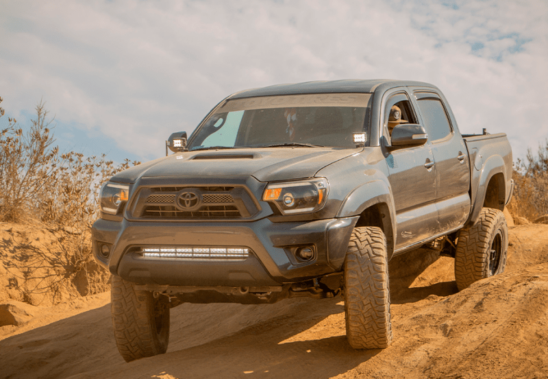 Cali Raised LED Low Profile Ditch Light Brackets Kit for 2005 - 2015 Toyota Tacoma - No Switch Included | calCR2863 - JDMuscleSPK800957