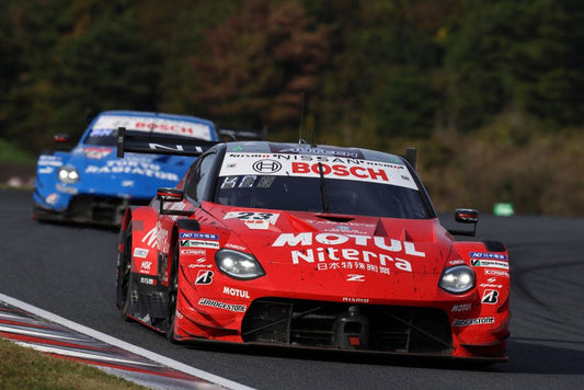 The #23 MOTUL Niterra Z and #12 TRS IMPUL Z in action at Autopolis, Super GT 2026