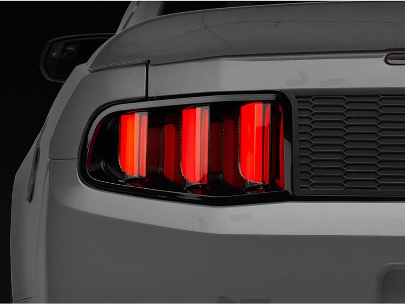 Raxiom 10-12 Ford Mustang Vector V2 LED Tail Lights - Gloss Black Housing | Clear Lens