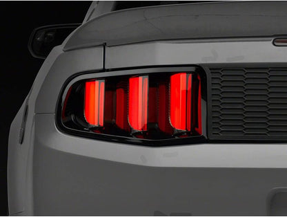 Raxiom 10-12 Ford Mustang Vector V2 LED Tail Lights - Gloss Black Housing | Clear Lens