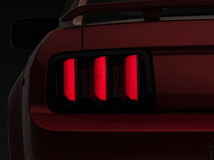 Raxiom 05-09 Ford Mustang Vector V2 LED Tail Lights- Black Housing | Smoked Lens