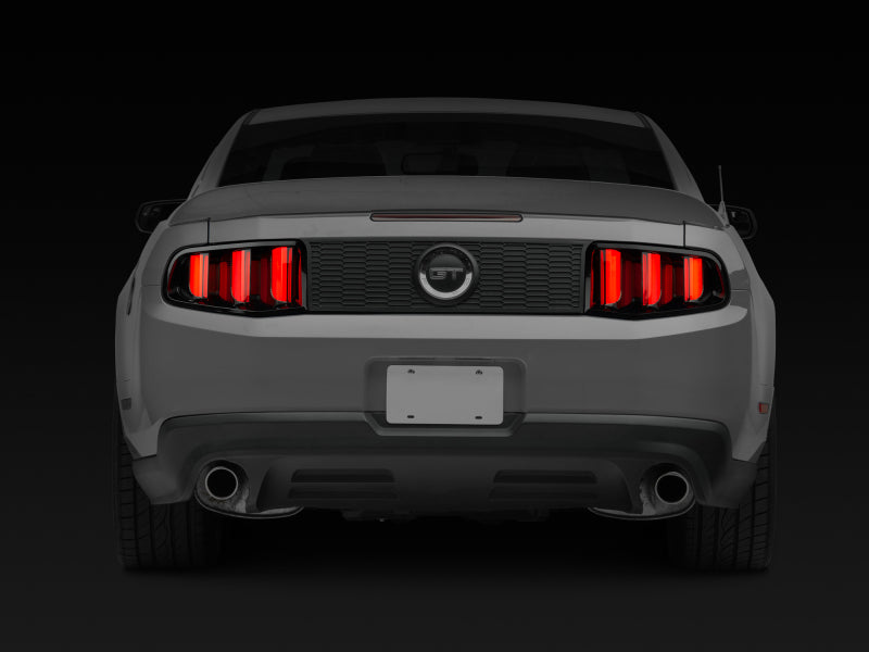 Raxiom 10-12 Ford Mustang Vector V2 LED Tail Lights - Gloss Black Housing | Clear Lens