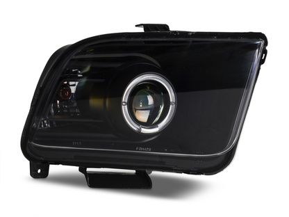 Raxiom 05-09 Ford Mustang Halogen 2010 Style LED Halo Headlights-Blk Hsng| Clear Lens/Excludes GT500