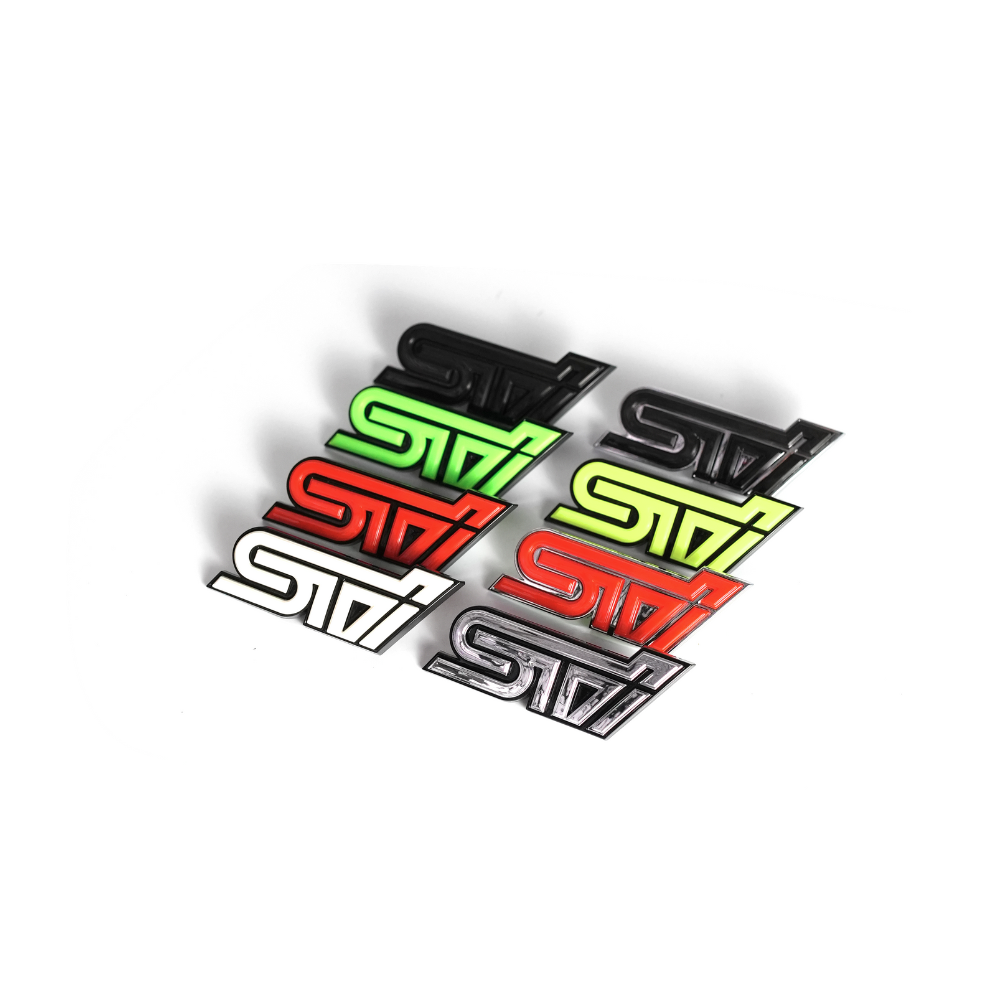 Racing Art STI Grille Emblem w/ Multiple Color Avaialable - Universal