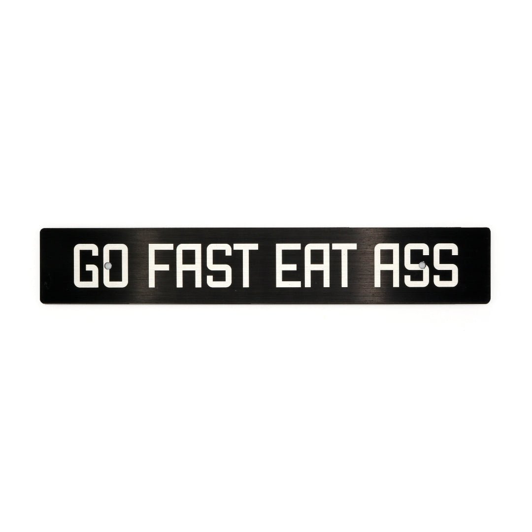 Billetworkz "Go Fast Eat Ass" License Plate Delete - JDMuscleLicense Plate HolderbwzBW-LPD-GFEA-USUniversal Fitment: Holes 7" apart (U.S. License Plate Mounting)