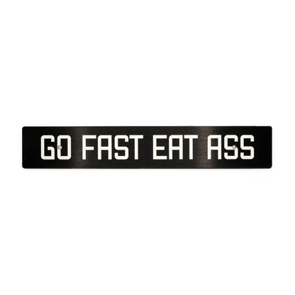 Billetworkz "Go Fast Eat Ass" License Plate Delete - JDMuscleLicense Plate HolderbwzBW-LPD-GFEA-USUniversal Fitment: Holes 7" apart (U.S. License Plate Mounting)