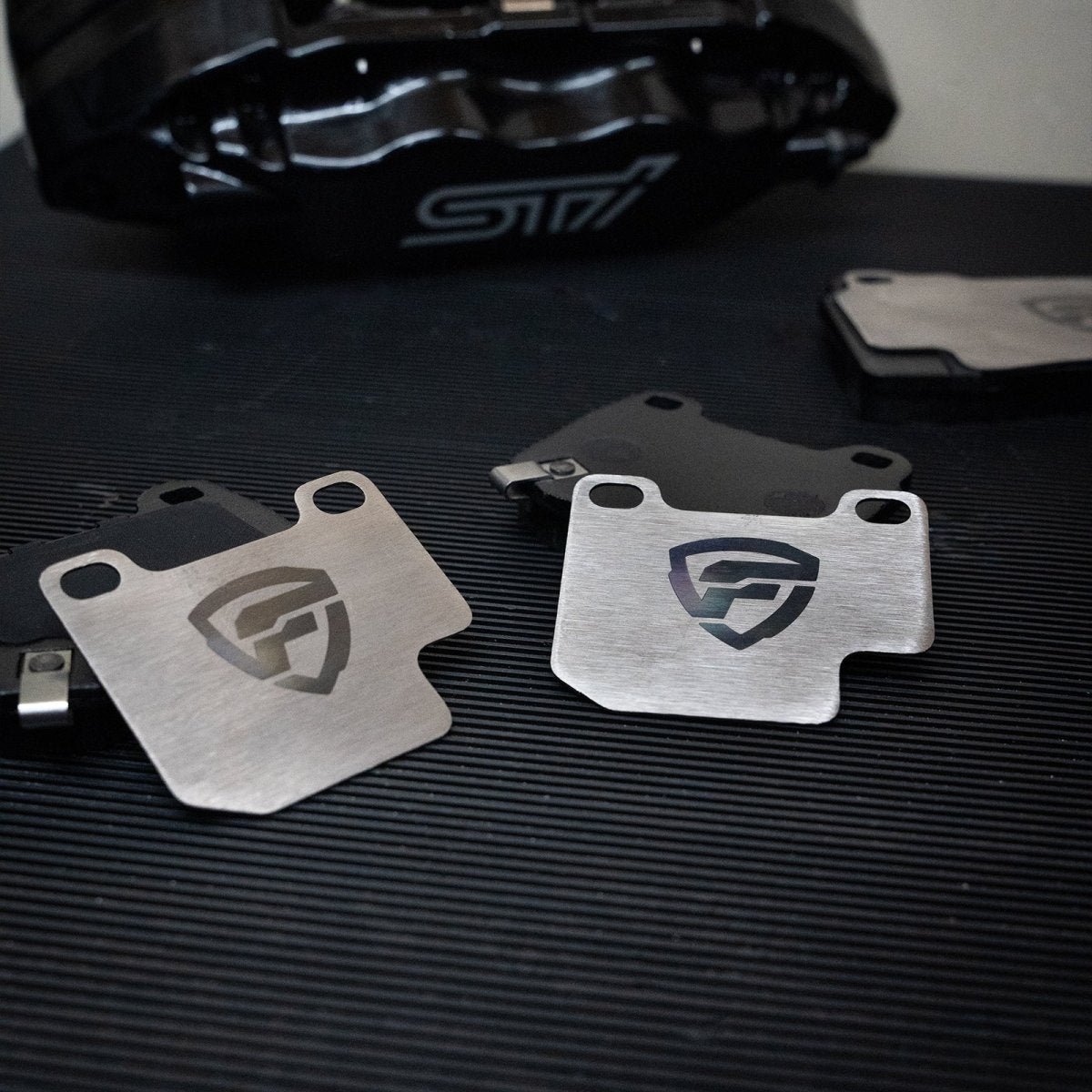 FactionFab Titanium Rear Brake Shim Set 2 Piston Brembo / 2004 - 2017 STI - JDMuscleFFA1.10315.2
