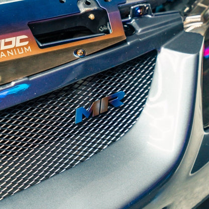 JDC Titanium "MR" Front Grill Badge (Evo 8/9) - JDMuscleBadgesJDC-TI-MR-MGRILLBurnt