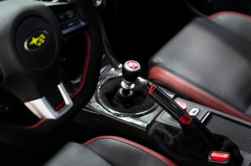 OLM [15 - 21 WRX/STI, 13 - 22 FR - S/BRZ/86, 14 - 18 Forester, 13+ Crosstrek] Signature Series E - brake Handle - Black Carbon w/Red | A.70217.1 - RD - JDMuscleInterior AccessoriesOLMA.70217.1-RD