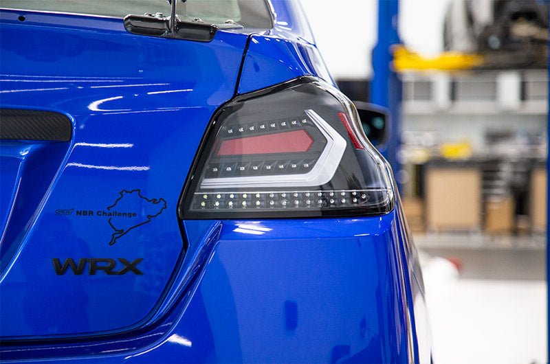 OLM [15 - 21 WRX/STI] Evolution Tail Lights - Clear Lens, Black Base, White Bar | A.70032.1 - B - JDMuscleTail LightsOLMA.70032.1-B