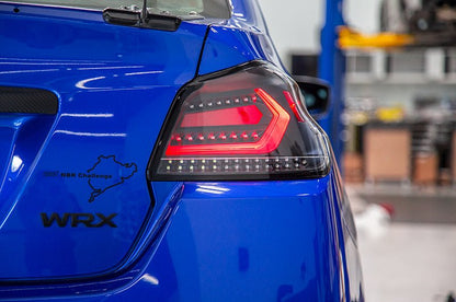 OLM [15 - 21 WRX/STI] Evolution Tail Lights - Clear Lens, Black Base, White Bar | A.70032.1 - B - JDMuscleTail LightsOLMA.70032.1-B