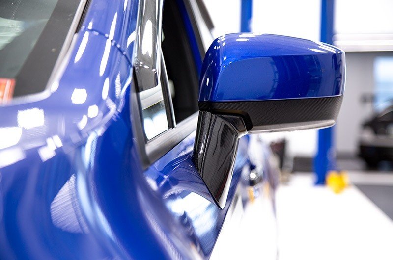 OLM LE Pre - preg Carbon Fiber Lower Mirror Mount Cover - 2015 - 2021 Subaru WRX / STI / 2015 - 2017 Crosstrek - JDMuscleOLMA.70093.1