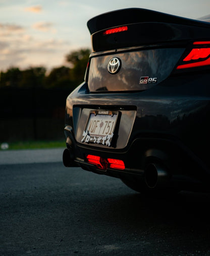 OLM V2 F1 Rear Fog Light (Clear Lens, Black Base, Red Bar) - 2022 BRZ / GR86 - JDMuscleOLME.49002.1-CBR