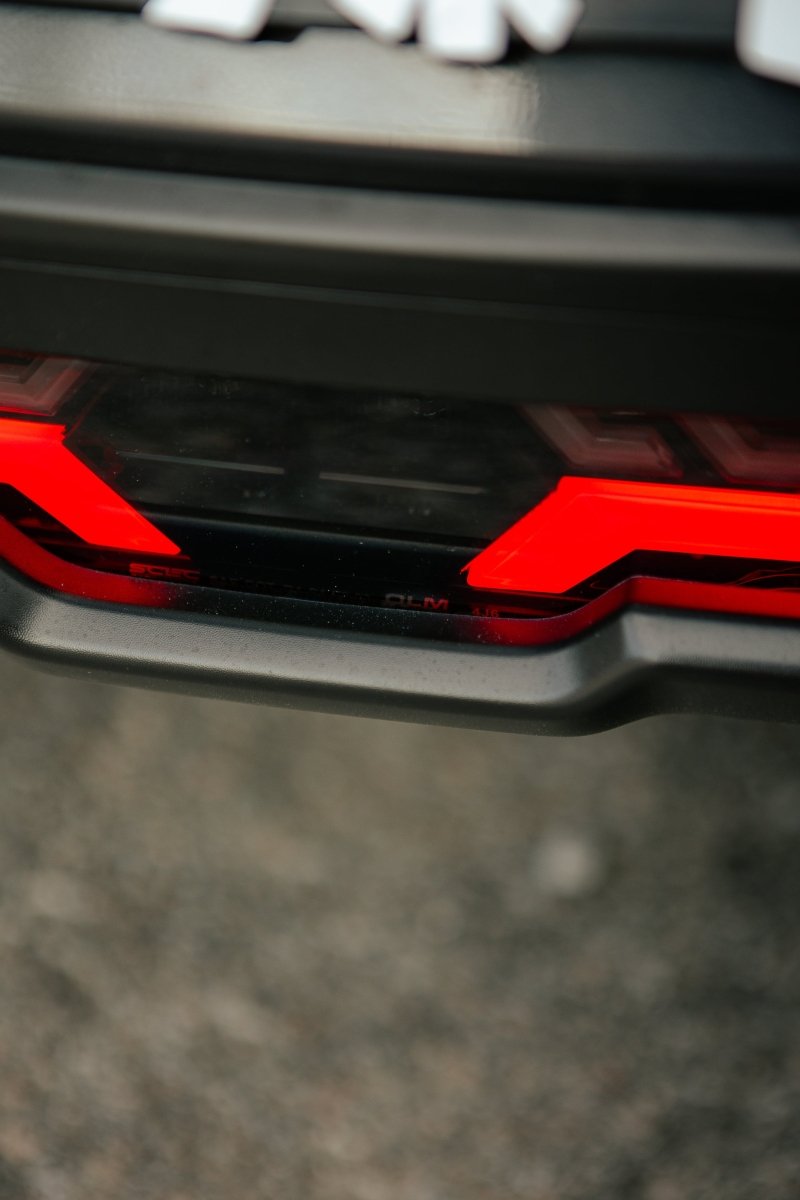 OLM V2 F1 Rear Fog Light (Clear Lens, Black Base, Red Bar) - 2022 BRZ / GR86 - JDMuscleOLME.49002.1-CBR