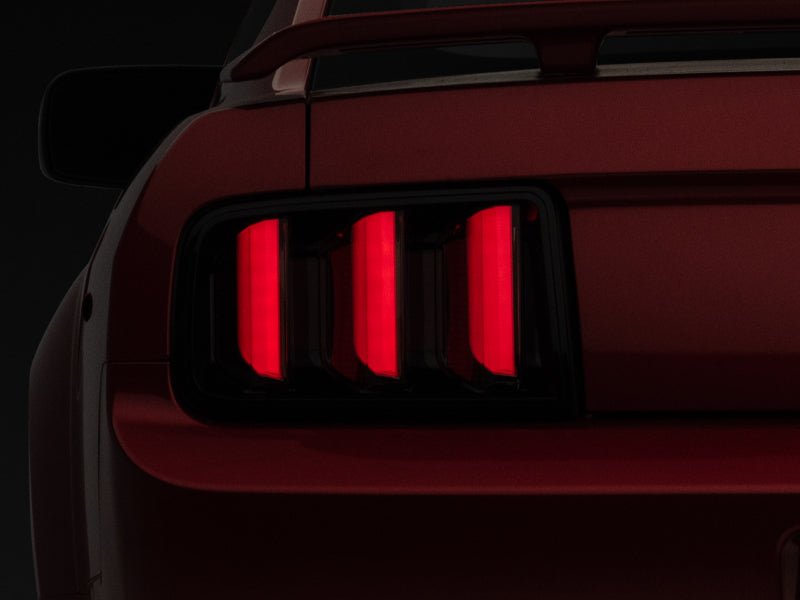 Raxiom 05 - 09 Ford Mustang Vector V2 LED Tail Lights - Black Housing | Smoked Lens - JDMuscleShop the look 2rax408588
