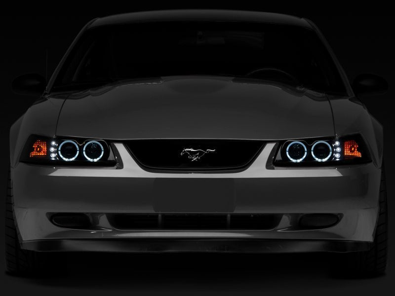 Raxiom 99 - 04 Ford Mustang Dual LED Halo Projector Headlights - Black Housing | Smoked Lens - JDMuscleShop the look 2rax49113