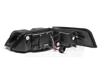 Raxiom 99 - 04 Ford Mustang Dual LED Halo Projector Headlights - Black Housing | Smoked Lens - JDMuscleShop the look 2rax49113