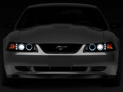 Raxiom 99 - 04 Ford Mustang Dual LED Halo Projector Headlights - Black Housing | Smoked Lens - JDMuscleShop the look 2rax49113