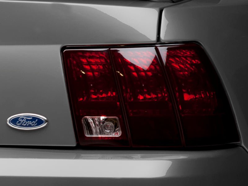 Raxiom 99 - 04 Ford Mustang Smoked Tail Lights with Black Housing | rax49080 - JDMuscleSPK547980