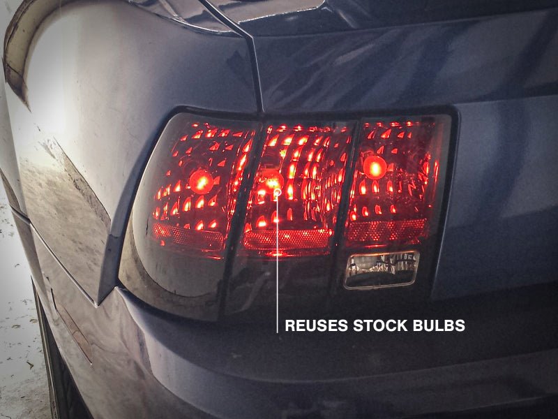 Raxiom 99 - 04 Ford Mustang Smoked Tail Lights with Black Housing | rax49080 - JDMuscleSPK547980