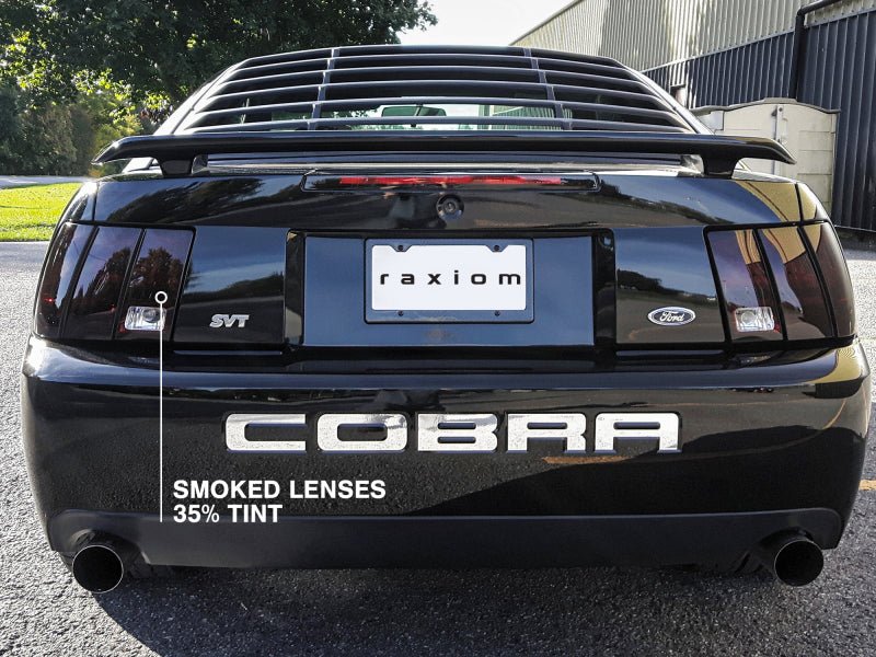 Raxiom 99 - 04 Ford Mustang Smoked Tail Lights with Black Housing | rax49080 - JDMuscleSPK547980