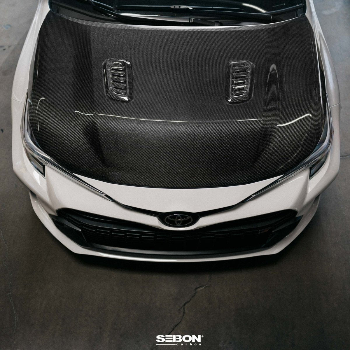 Seibon [23+ GR Corolla] OE - Style Double - Sided Carbon Fiber Hood | HD23TYGRCOR - OE - DS - JDMuscleHoodsseiHD23TYGRCOR-OE-DS