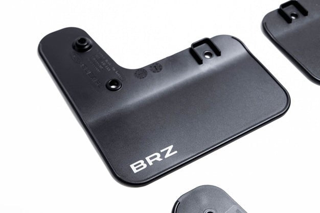 Subaru OEM 2022 BRZ Mudflap Set Black w/ White Logo | J101SCC000 - JDMuscleMudflapsJ101SCC000