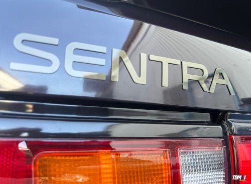 TDMi Reproduction | B13 Sentra Trunk Badge - JDMuscleBlack
