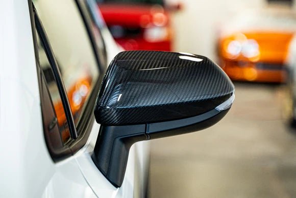 TOM'S Racing [23 - 26 GR Corolla, 19 - 26 Corolla Hatchback] Carbon Fiber Mirror Covers | TMS - 87950 - TEA14 - JDMuscleExterior GarnishestmsTMS-87950-TEA14