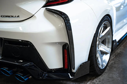 TOM'S Racing [23+ GR Corolla] Carbon Fiber Rear Bumper Garnish | TMS - 52158 - TEA14 - JDMuscleExterior GarnishestmsTMS-52158-TEA14