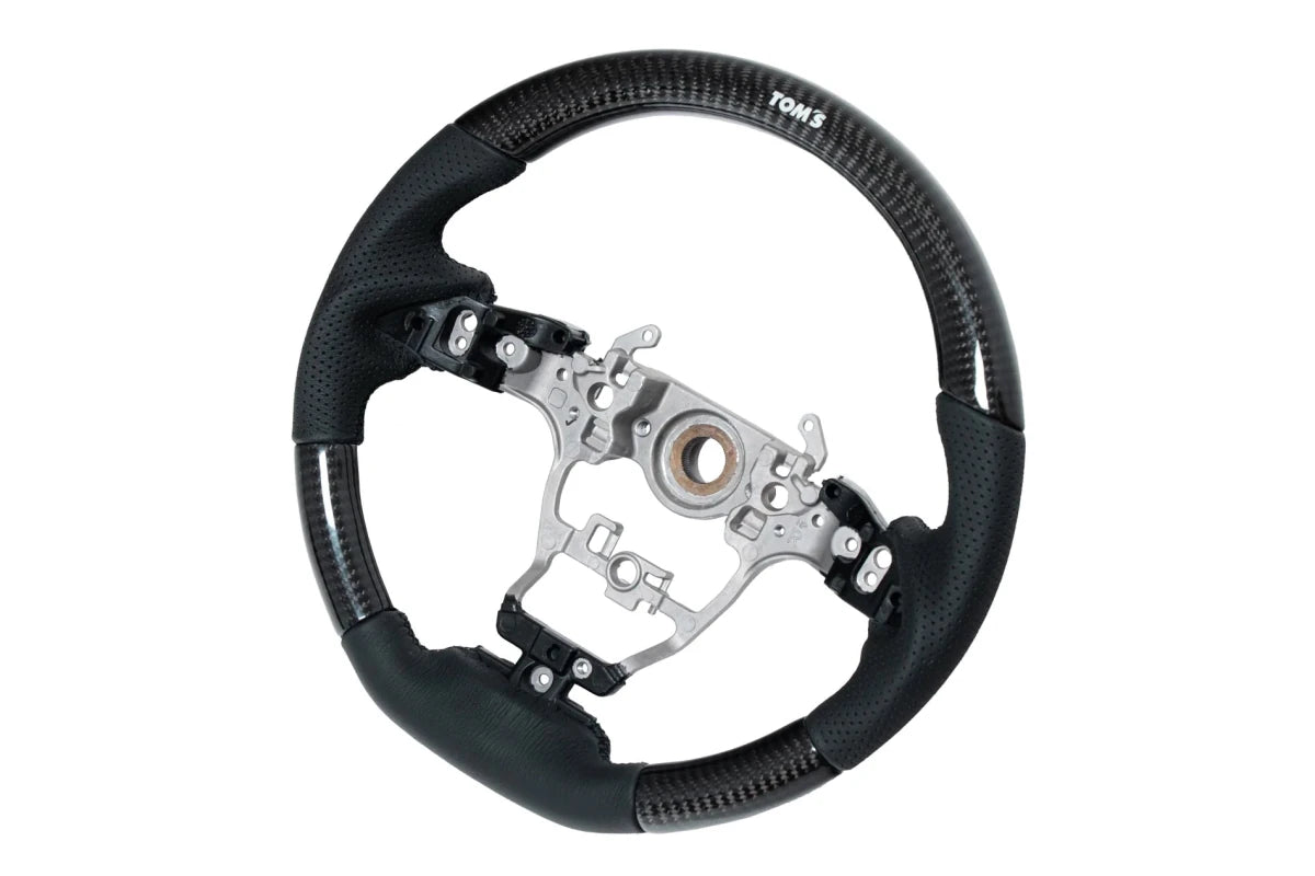 TOM'S Racing [23+ GR Corolla] Steering Wheel - Carbon | TMS - 45100 - TPA16 - JDMuscleSteering WheelstmsTMS-45100-TPA16