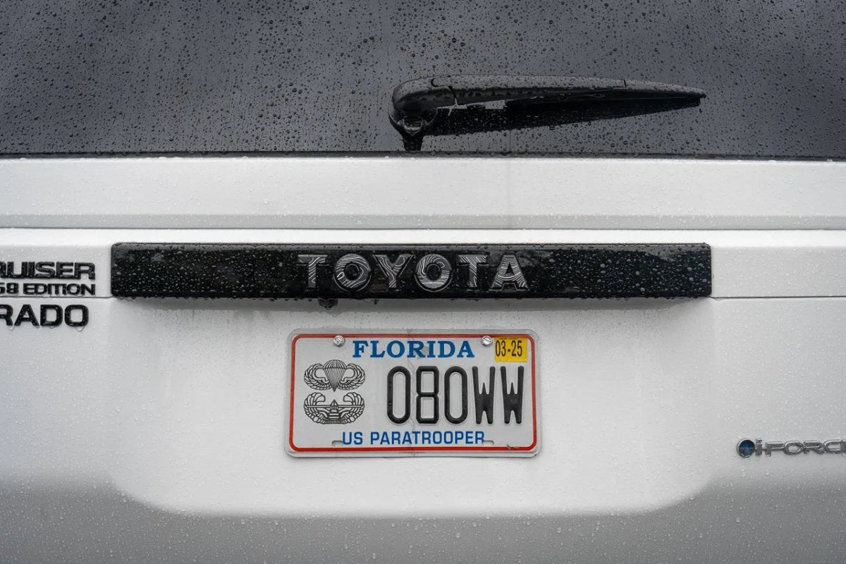 "TOYOTA" Topo Rear Tailgate Emblem Overlays - 2024+ Land Cruiser - JDMuscleEmblems24LC250-RT-TOYOTA-TPWHWhite Lines