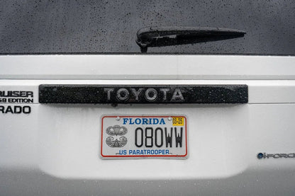 "TOYOTA" Topo Rear Tailgate Emblem Overlays - 2024+ Land Cruiser - JDMuscleEmblems24LC250-RT-TOYOTA-TPWHWhite Lines
