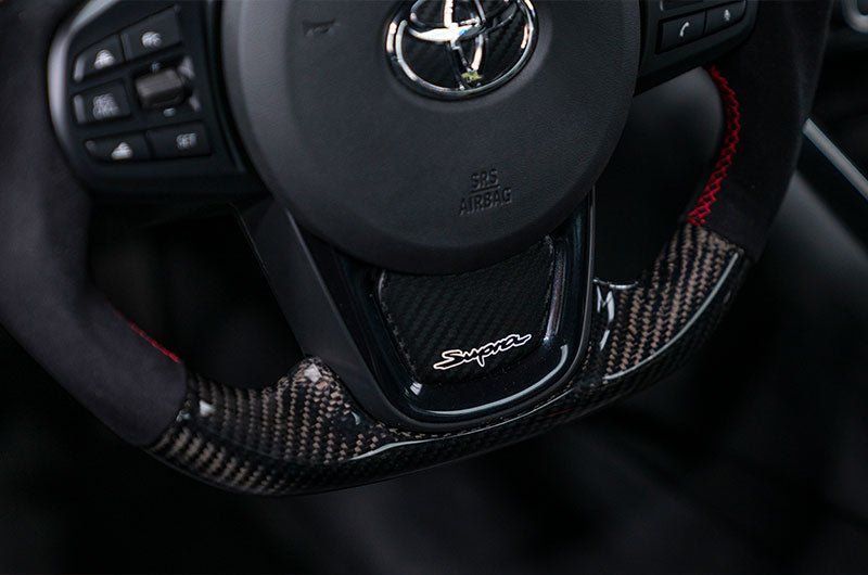 OLM CARBON PRO STEERING WHEEL CARBON FIBER AND ALCANTARA WITH RED STRIPE 2020-21 Toyota A90 Supra | OLMA.70223.1 - JDMuscleSteering WheelsOLMA.70223.1
