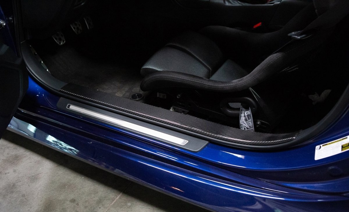 Revel 2022 GR86/BRZ GT Dry Carbon Scuff Plate Cover - 2 Pieces | 1TR4GT0CS03 - JDMuscleTrim Kitsrvl1TR4GT0CS03