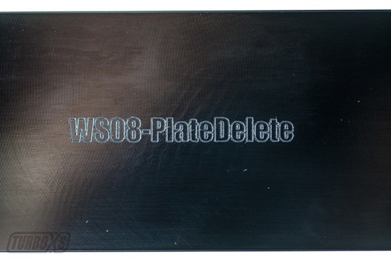 Turbo XS 08-14 WRX/STi Billet Aluminum License Plate Delete Black Machined TurboXS Logo | WS08-LPD-BLK-TXS - JDMuscleLicense Plate Holders and DeletesTXS-WS08-LPD-BLK-TXS